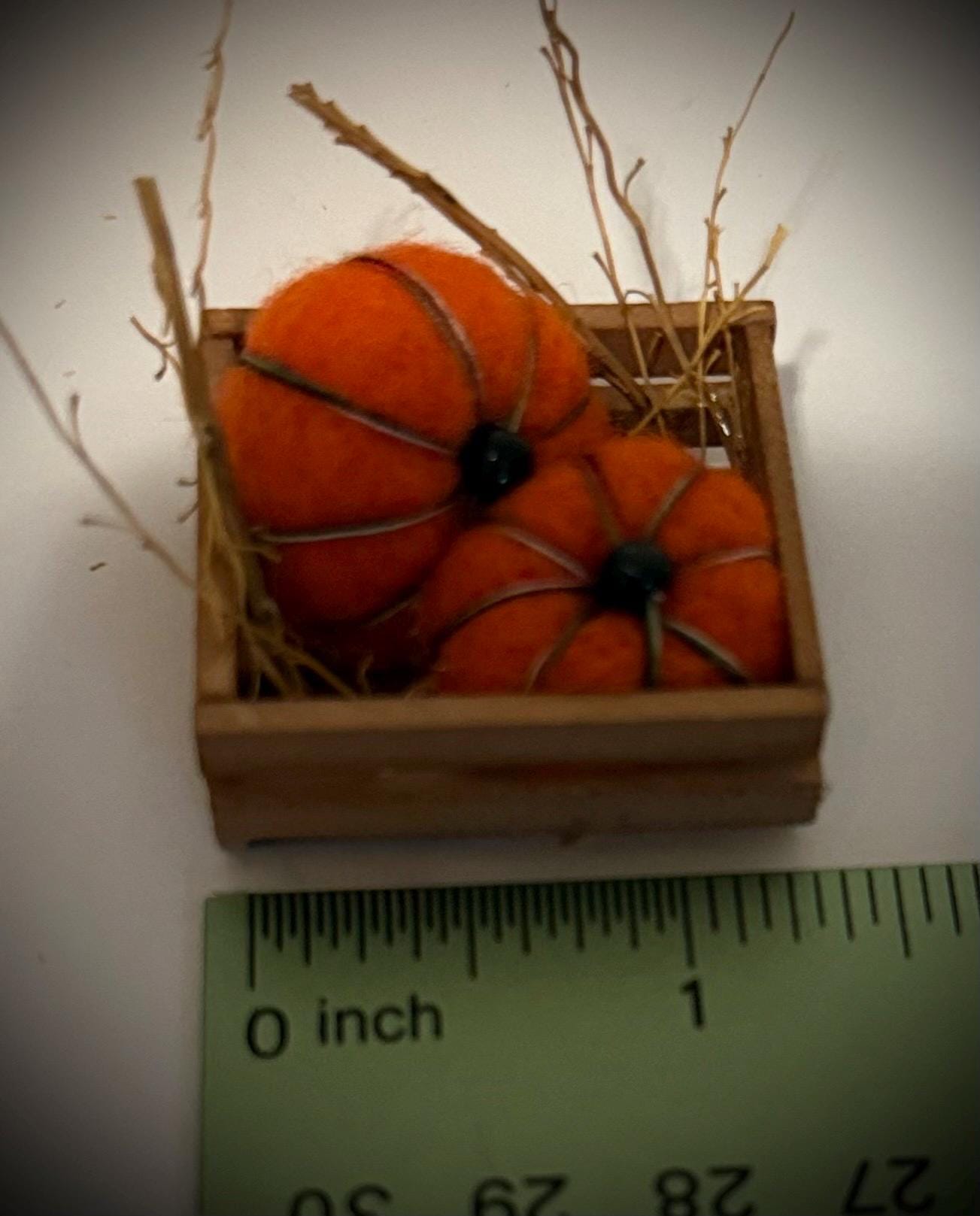 miniature pumpkins in wood crate- about  1 1/2” in length