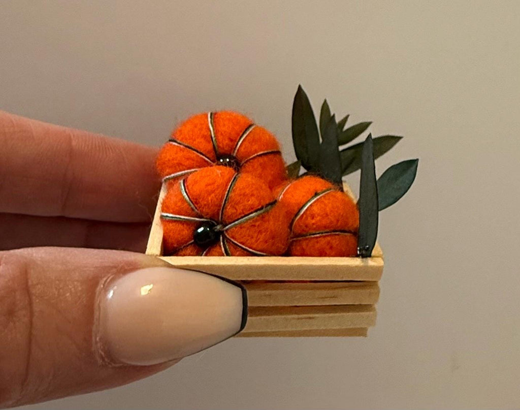 miniature pumpkins in wood crate-1 1/2”