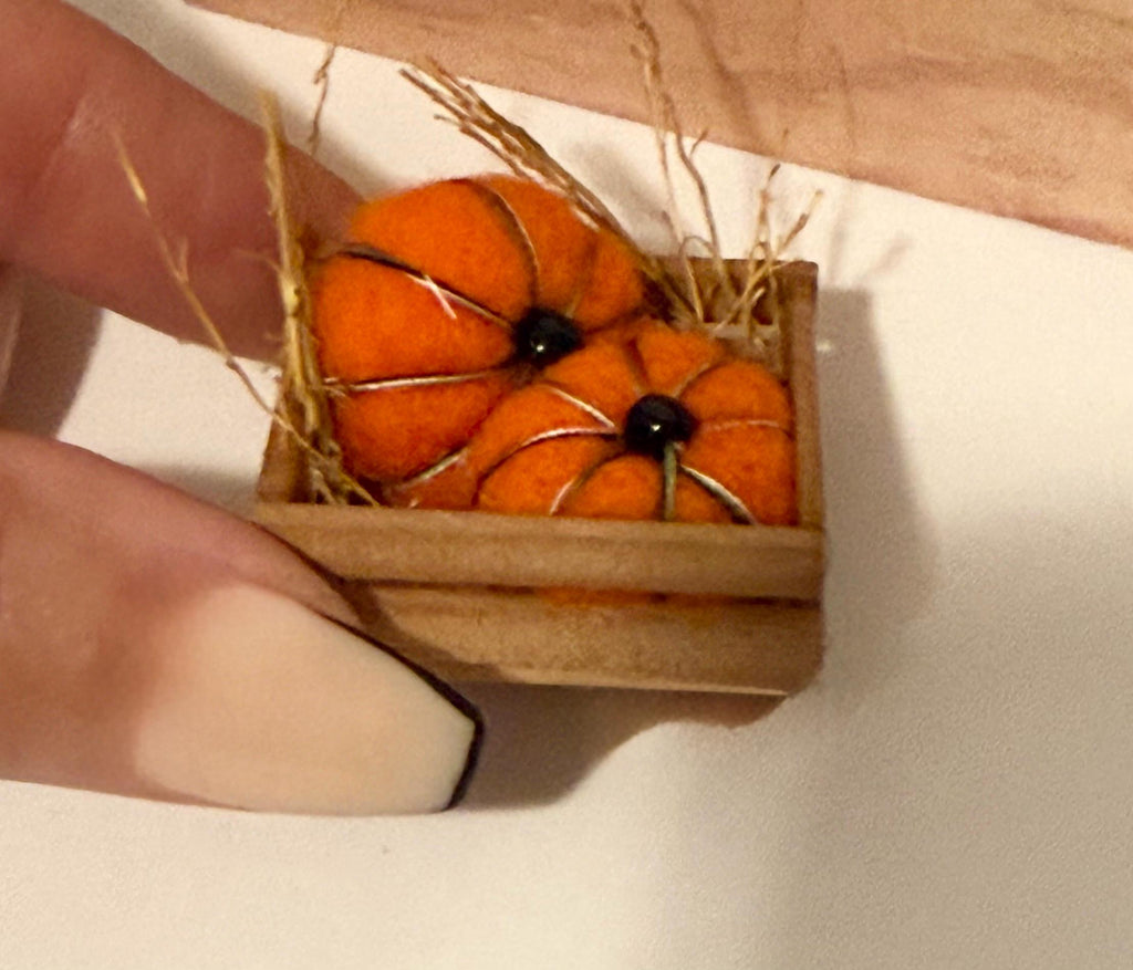 miniature pumpkins in wood crate- about  1 1/2” in length