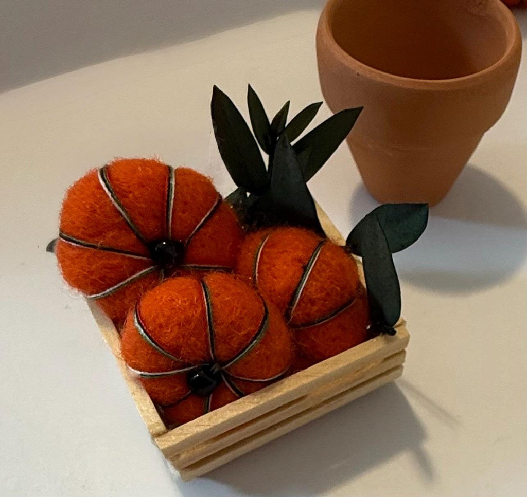 miniature pumpkins in wood crate-1 1/2”