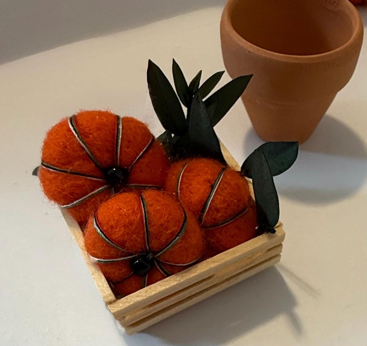miniature pumpkins in wood crate-1 1/2”