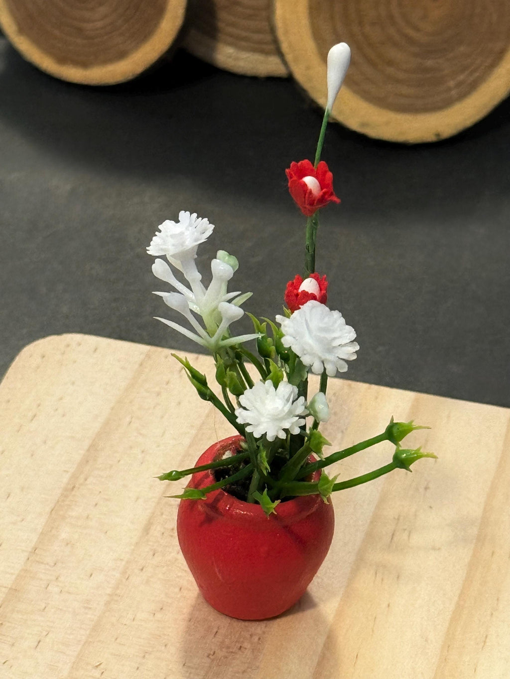 Miniature plant with Flower in terracotta pot