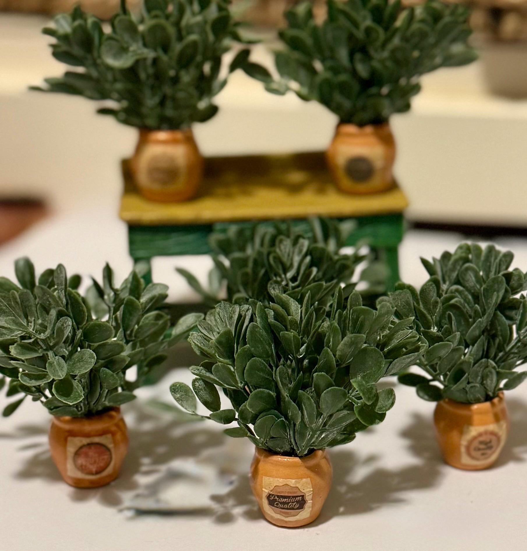 Miniature ceramic clay potted plants with a vintage design