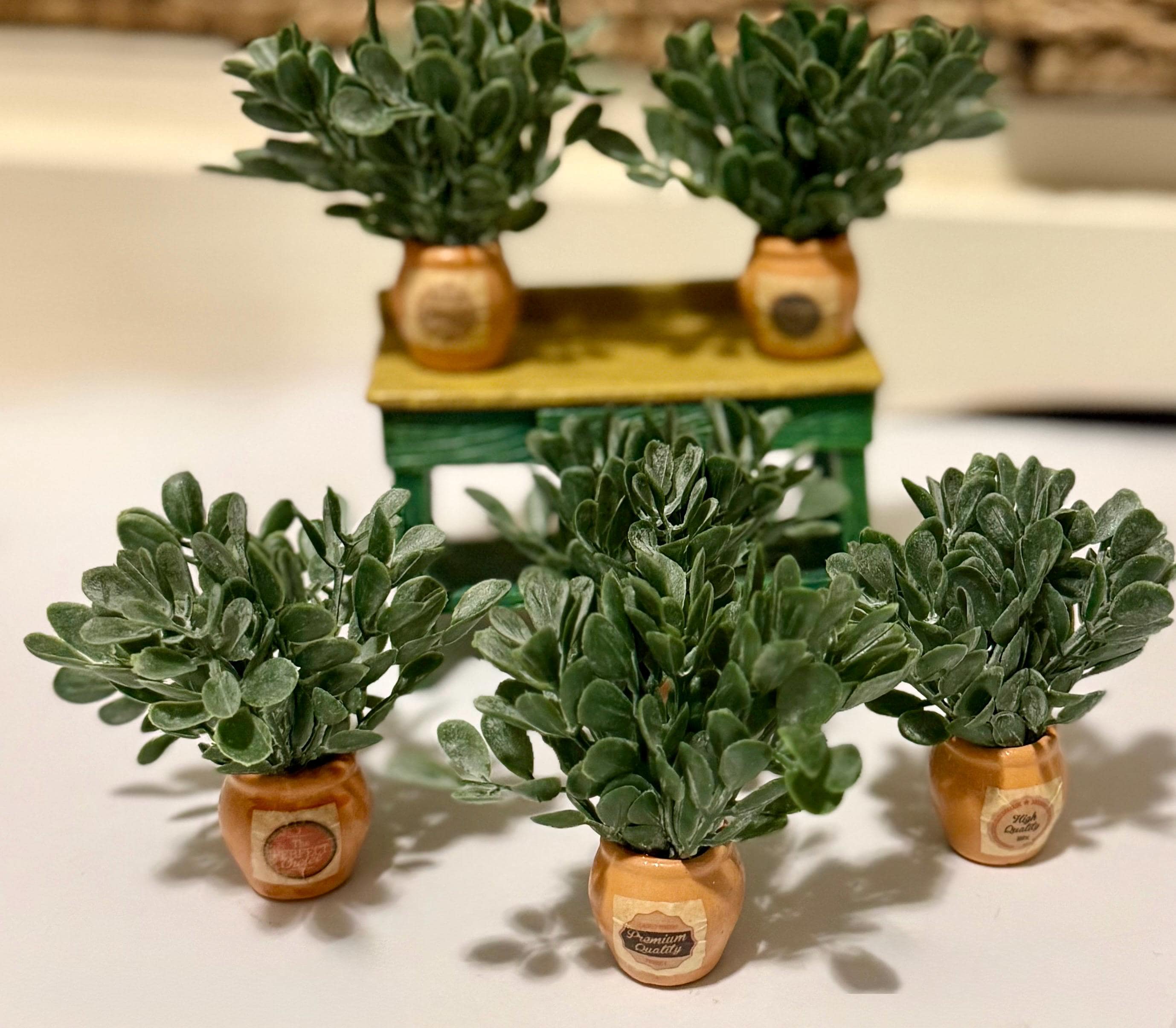 Miniature ceramic clay potted plants with a vintage design