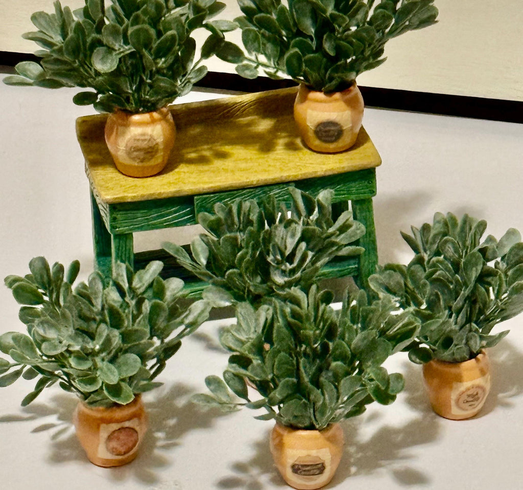 Miniature ceramic clay potted plants with a vintage design