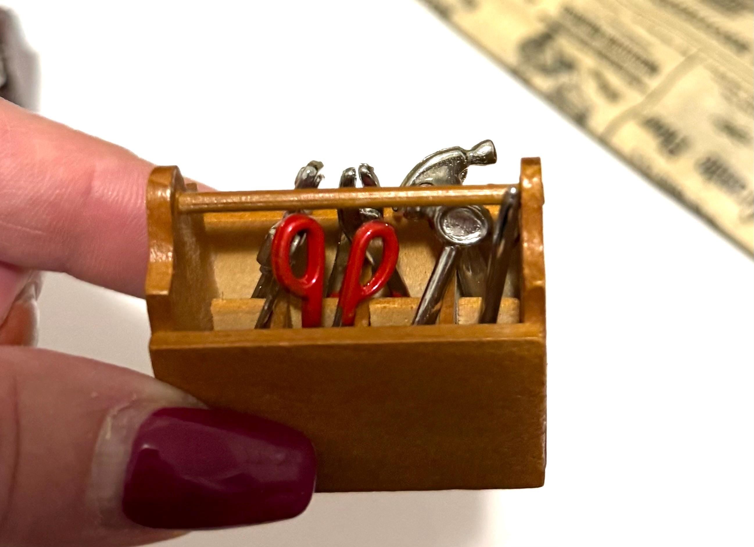 miniature wooden tool box with tools