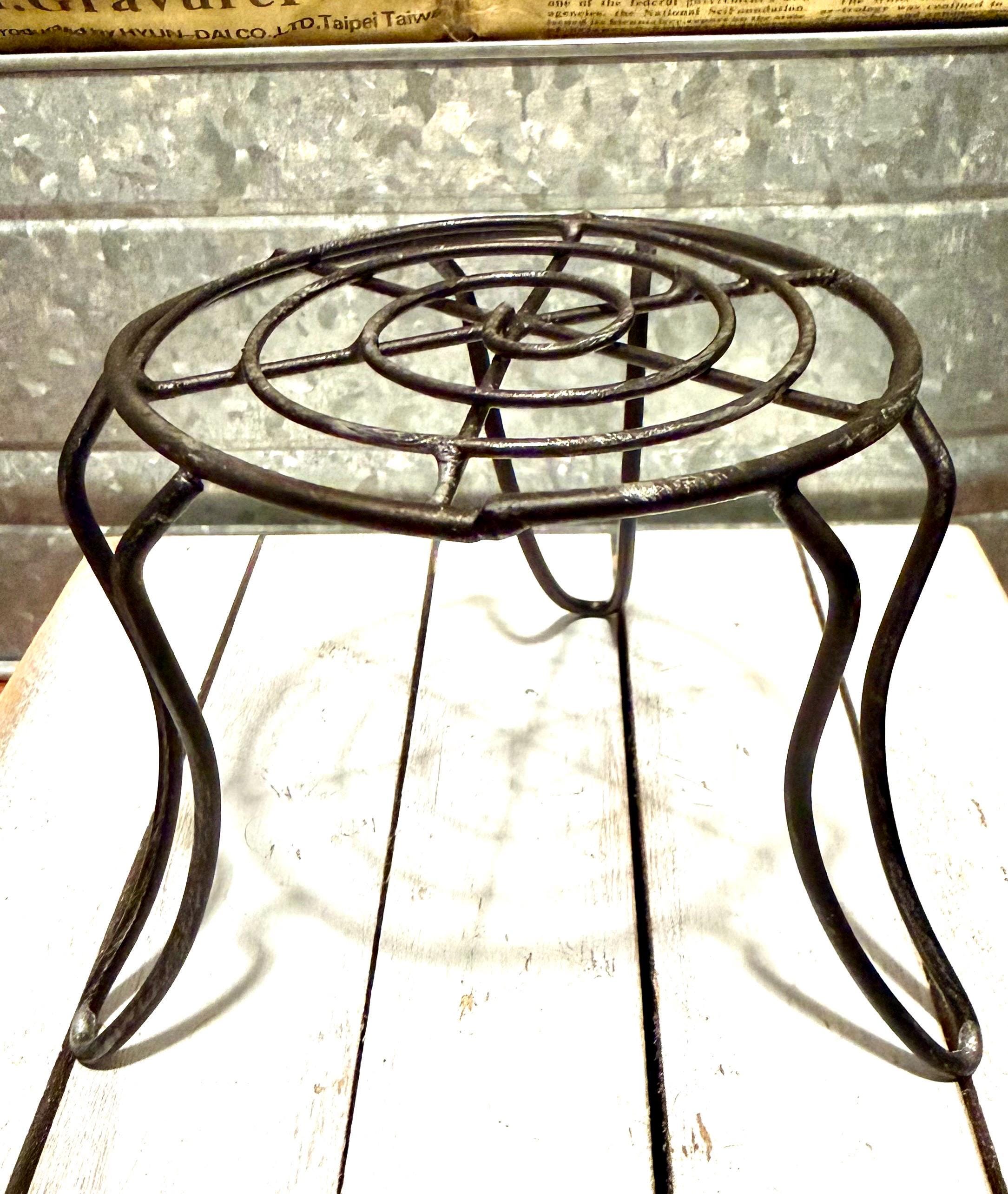Miniature black metal round garden table
