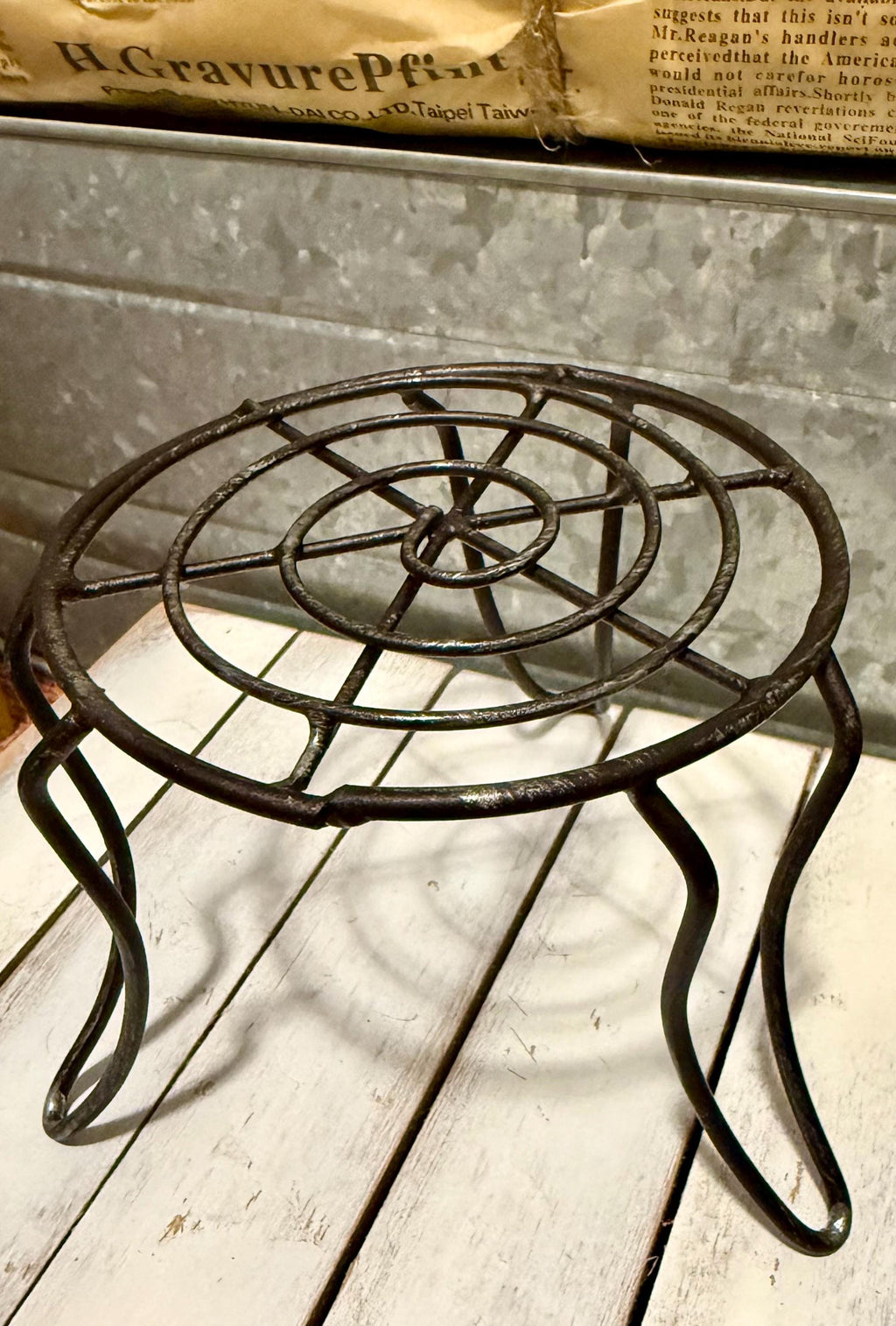 Miniature black metal round garden table