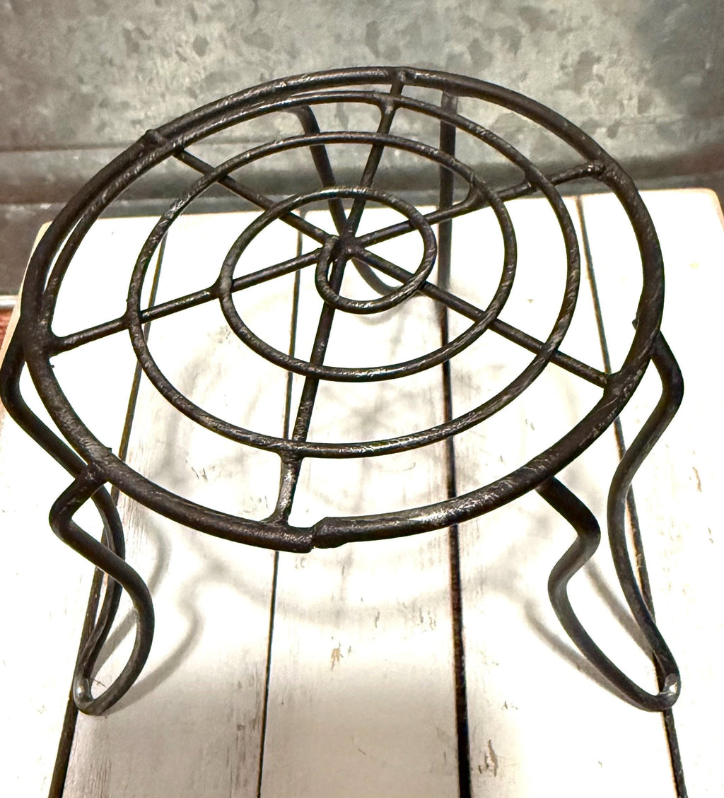 Miniature black metal round garden table