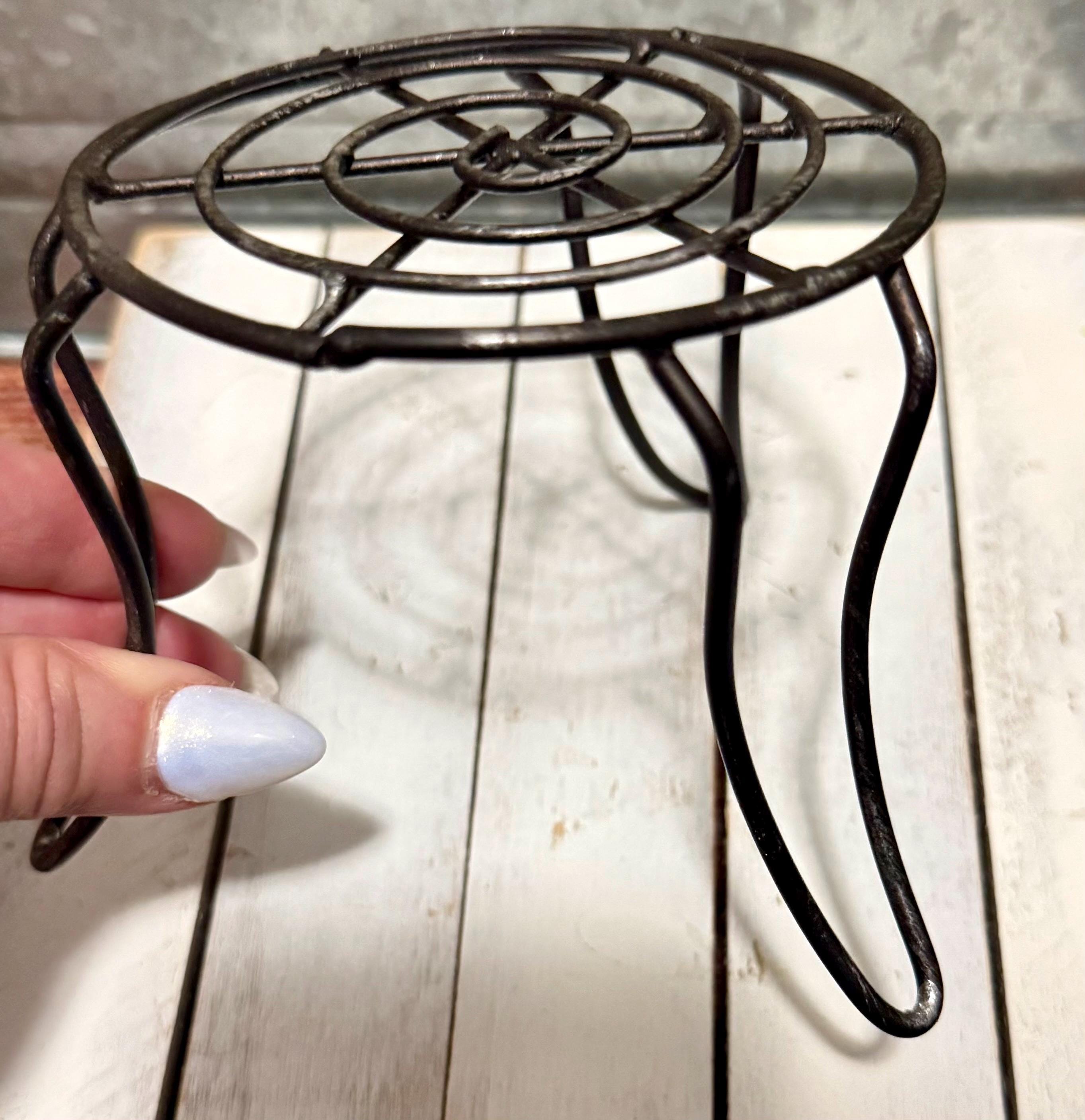 Miniature black metal round garden table