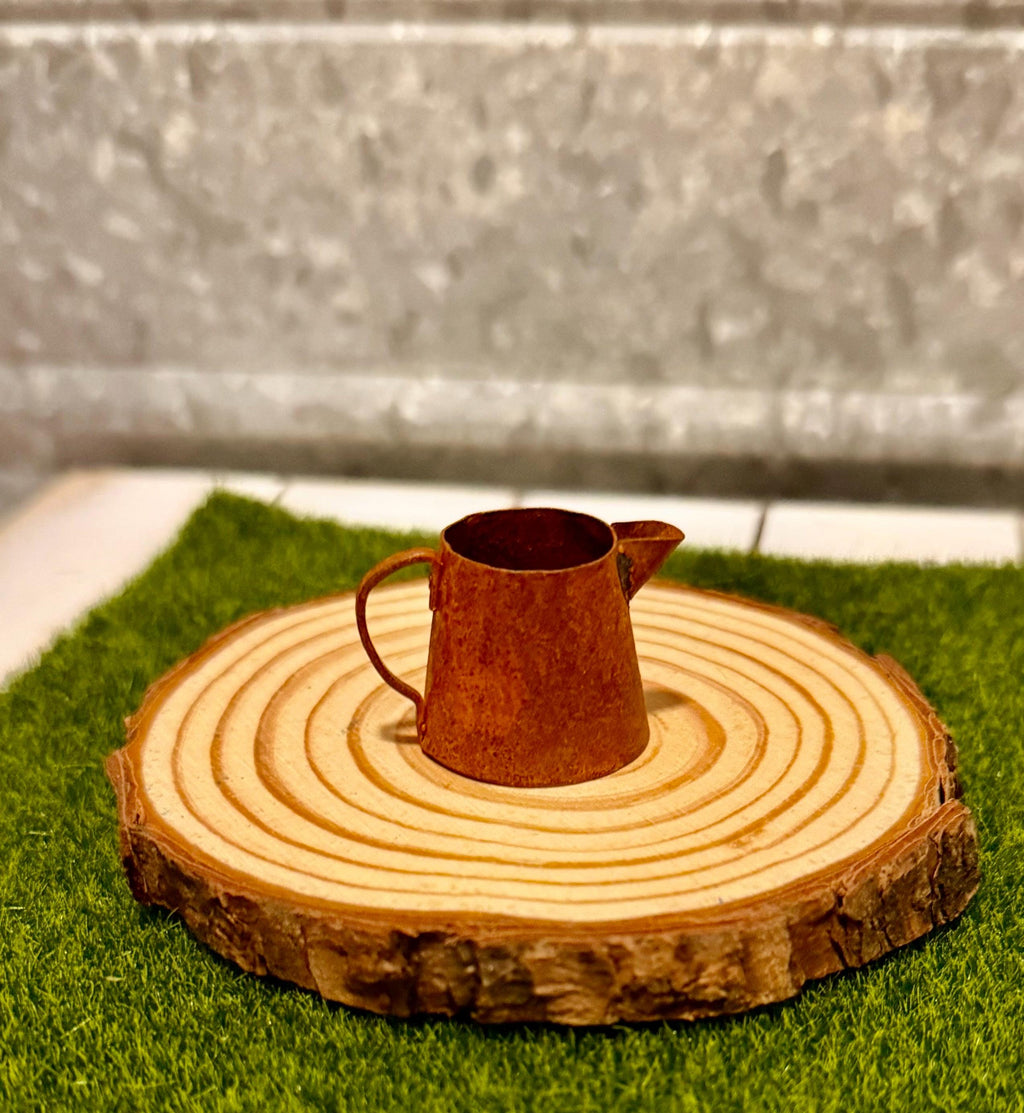 miniature metal rustic water can