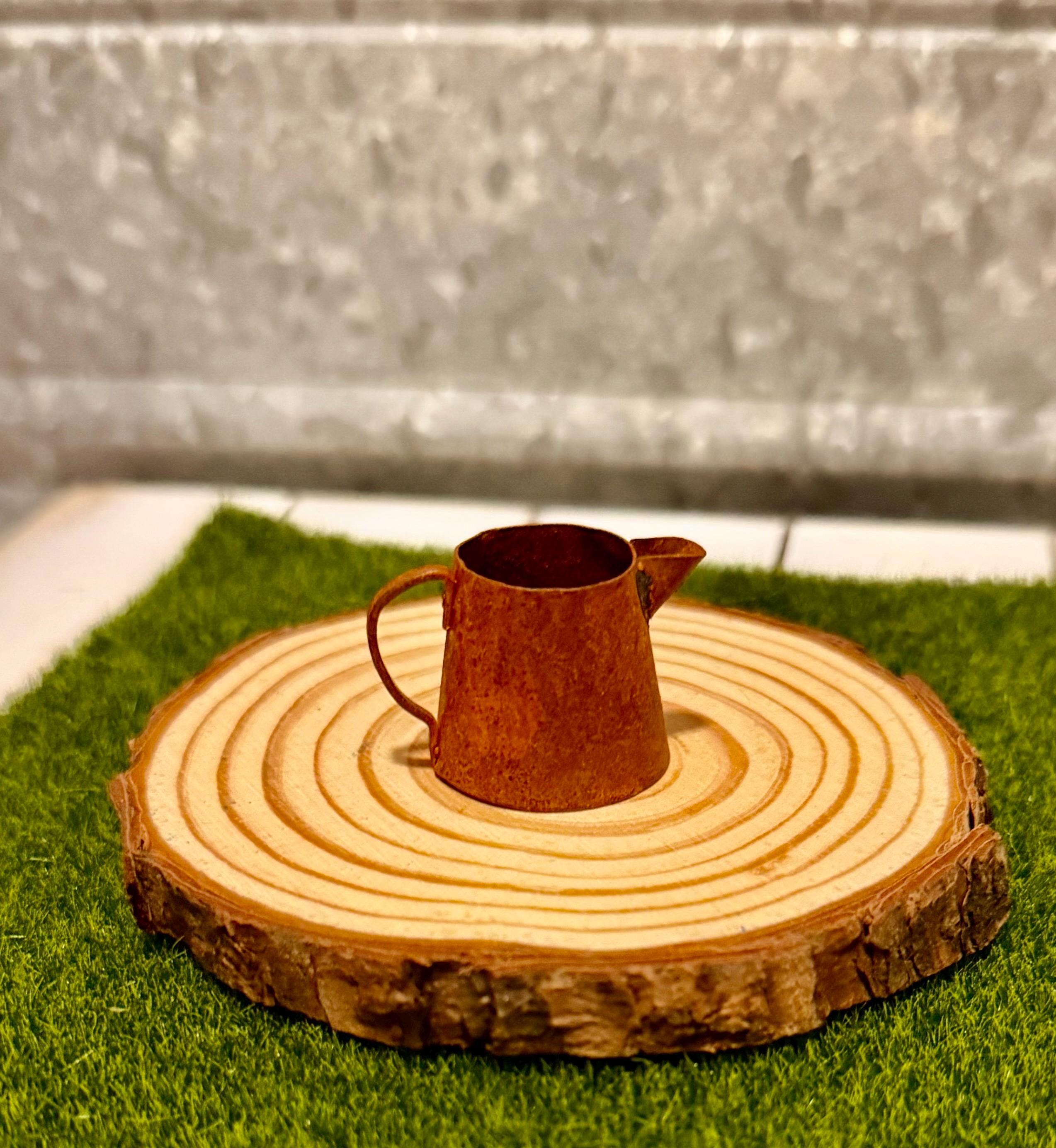 miniature metal rustic water can