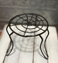 Miniature black metal round garden table