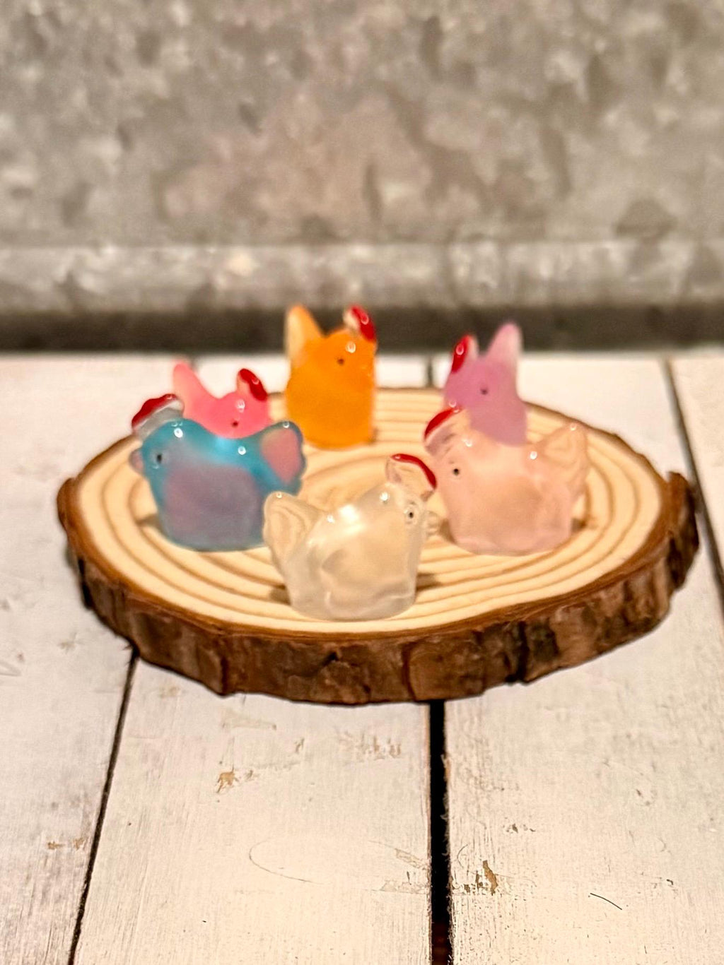Miniature colorful hen figurines