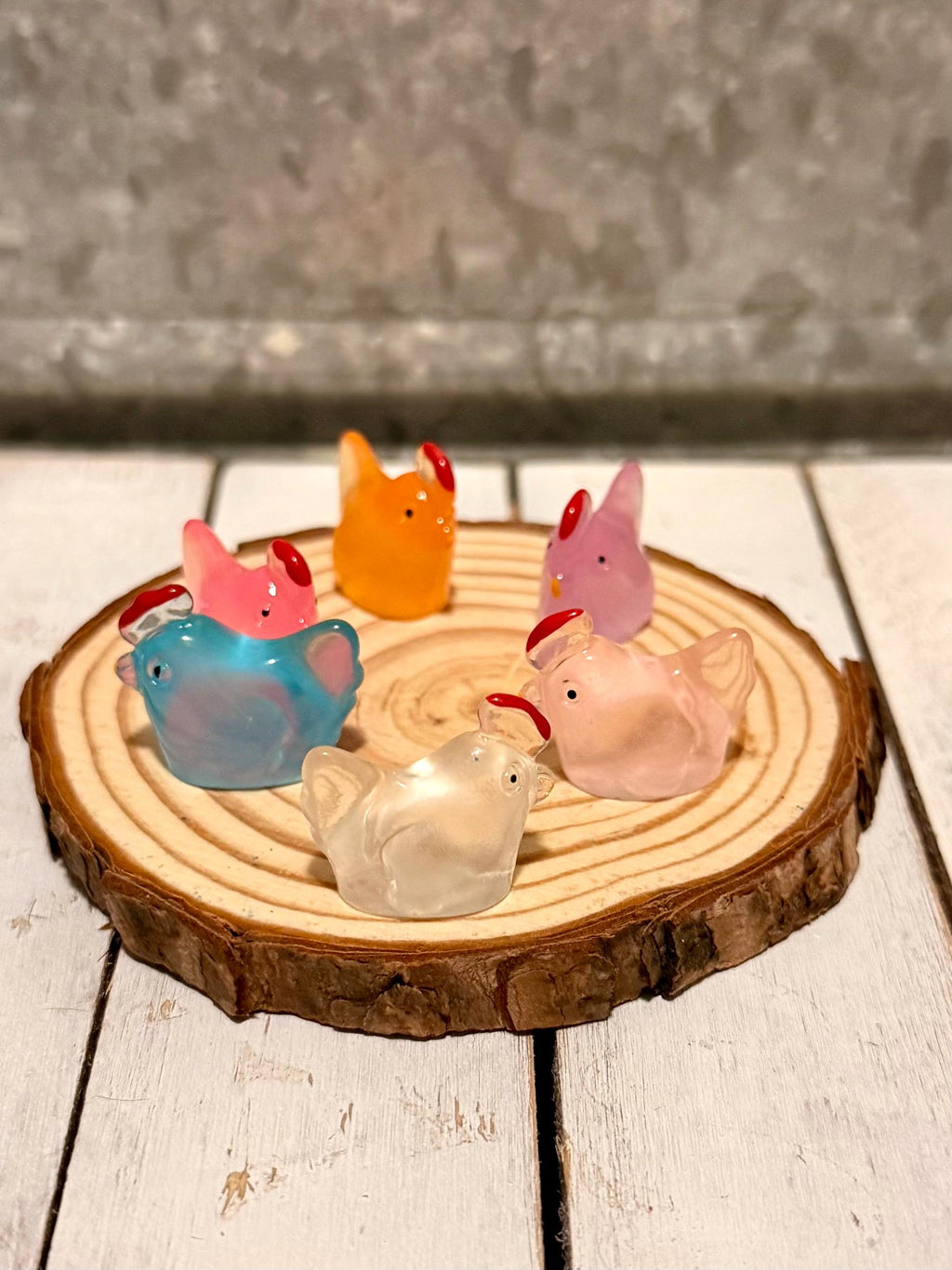 Miniature colorful hen figurines