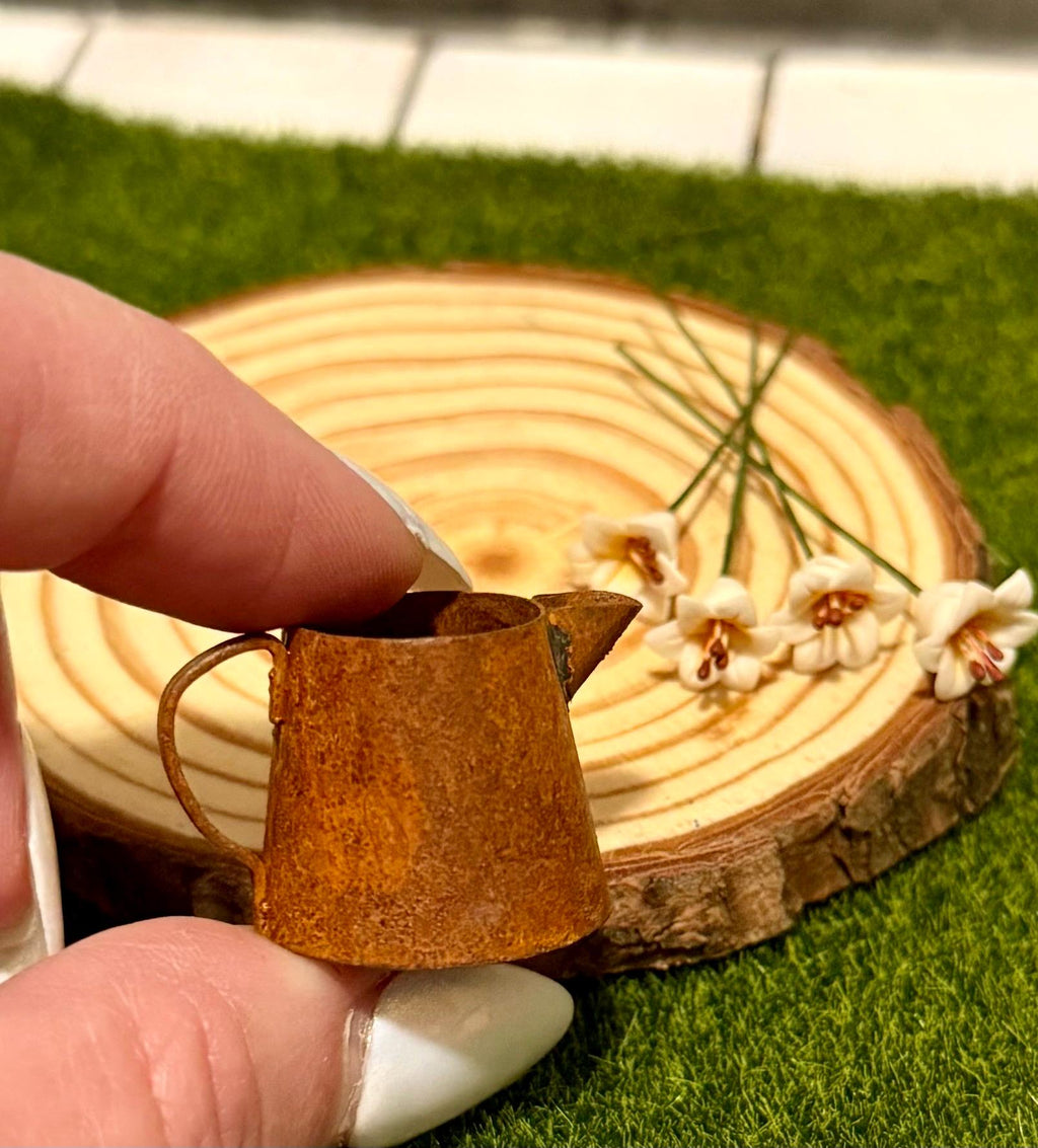 miniature metal rustic water can