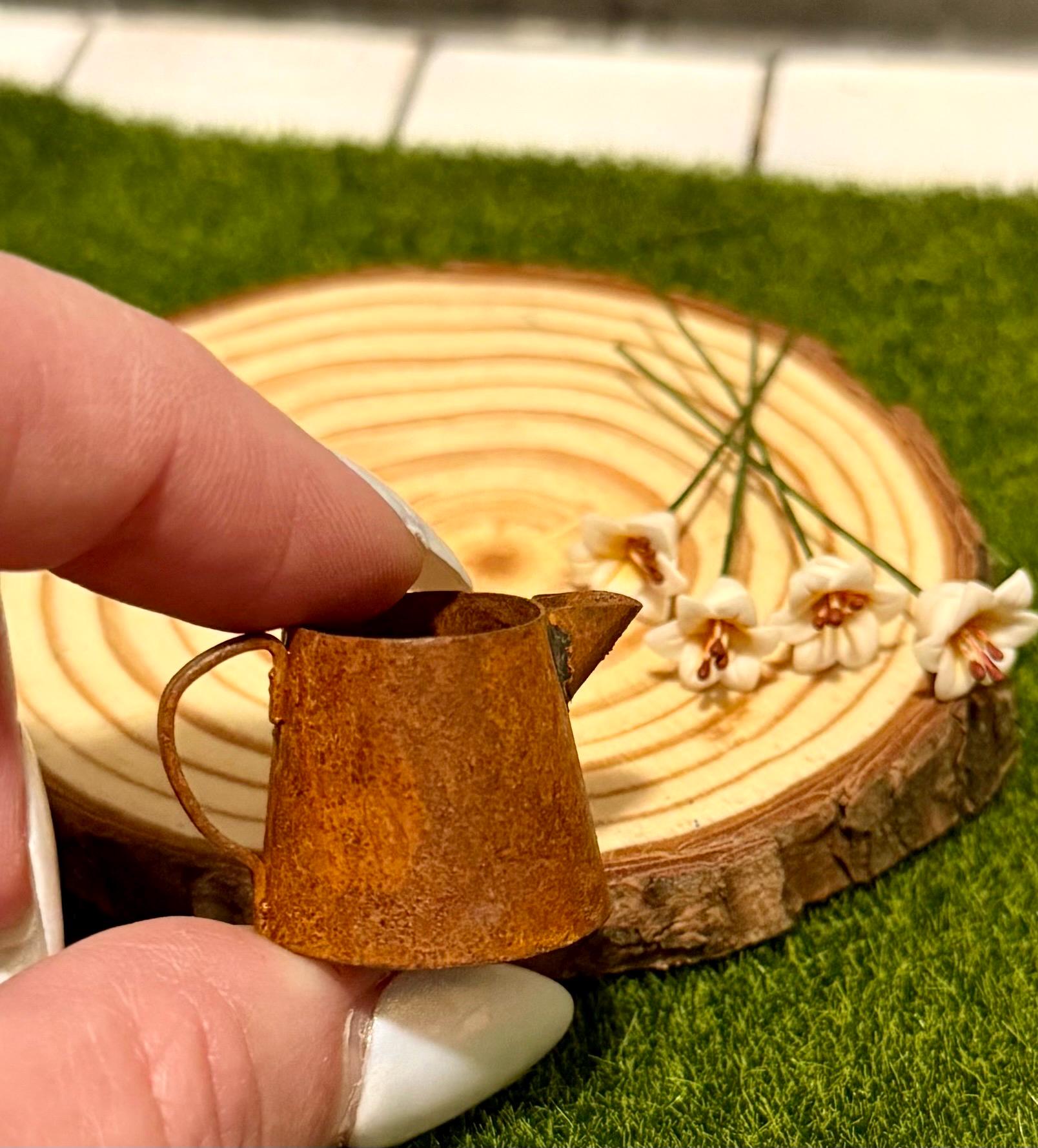 miniature metal rustic water can