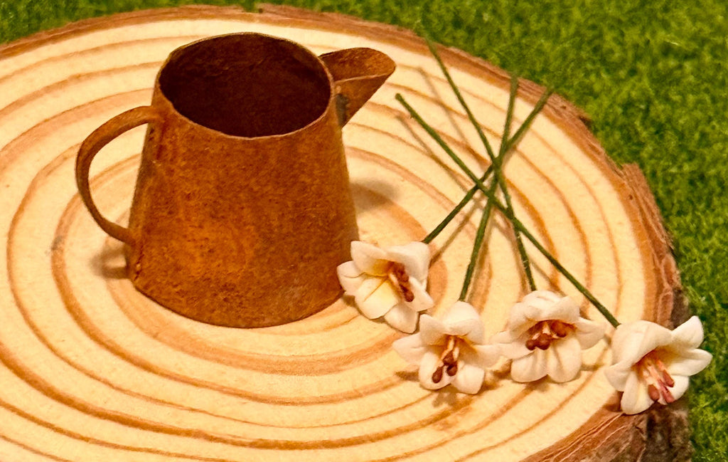 miniature metal rustic water can