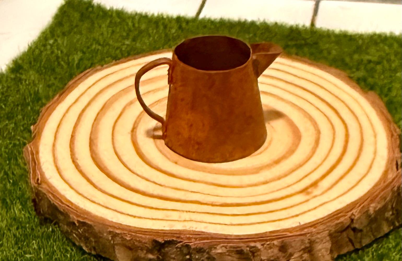 miniature metal rustic water can