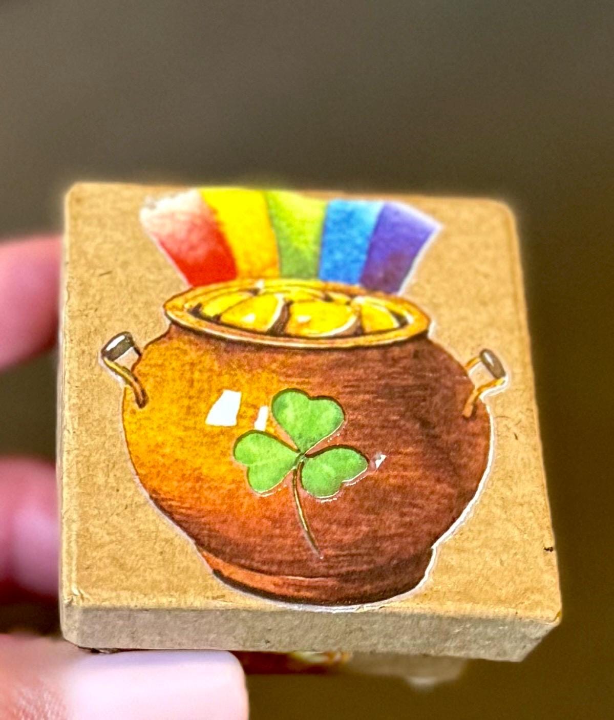 Miniature St. Patrick’s Day paper mache gift boxes with gnome and gold