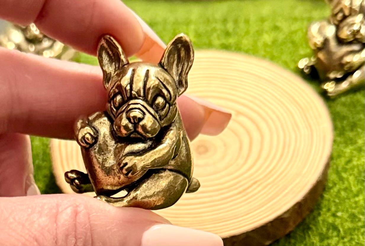 Miniature brass vintage Dog holding a heart figurine