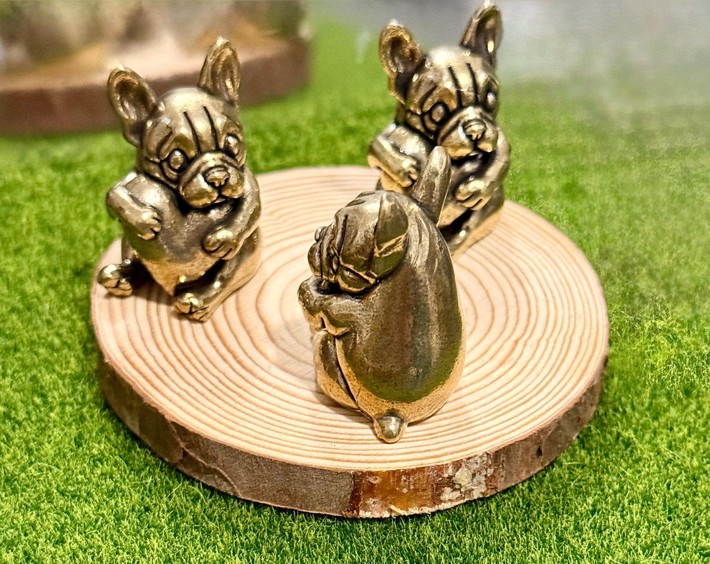 Miniature brass vintage Dog holding a heart figurine