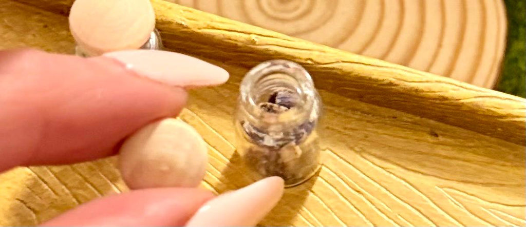 Miniature jars with button lid filled with lavender
