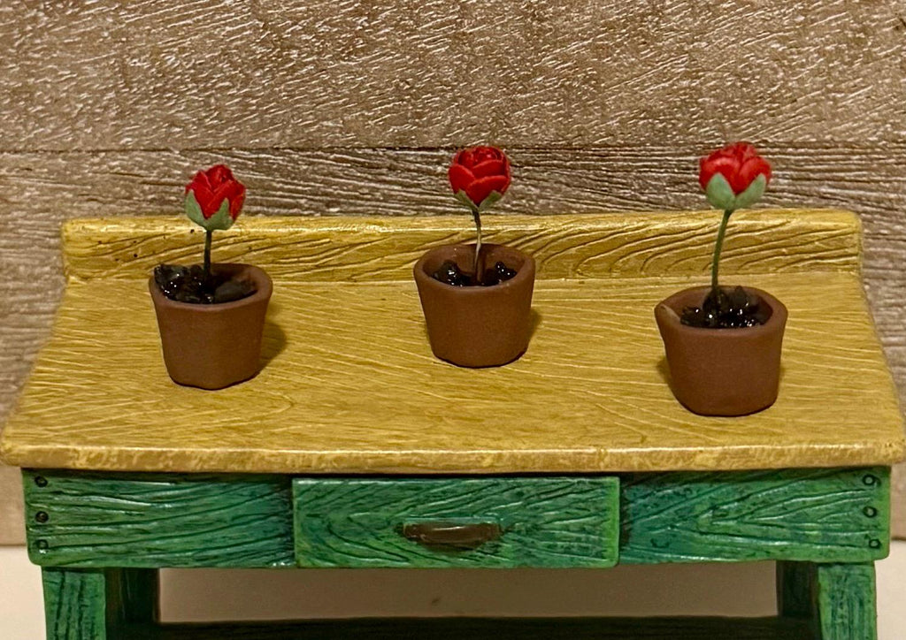 Miniature rose in a terracotta pot-dollhouse scale
