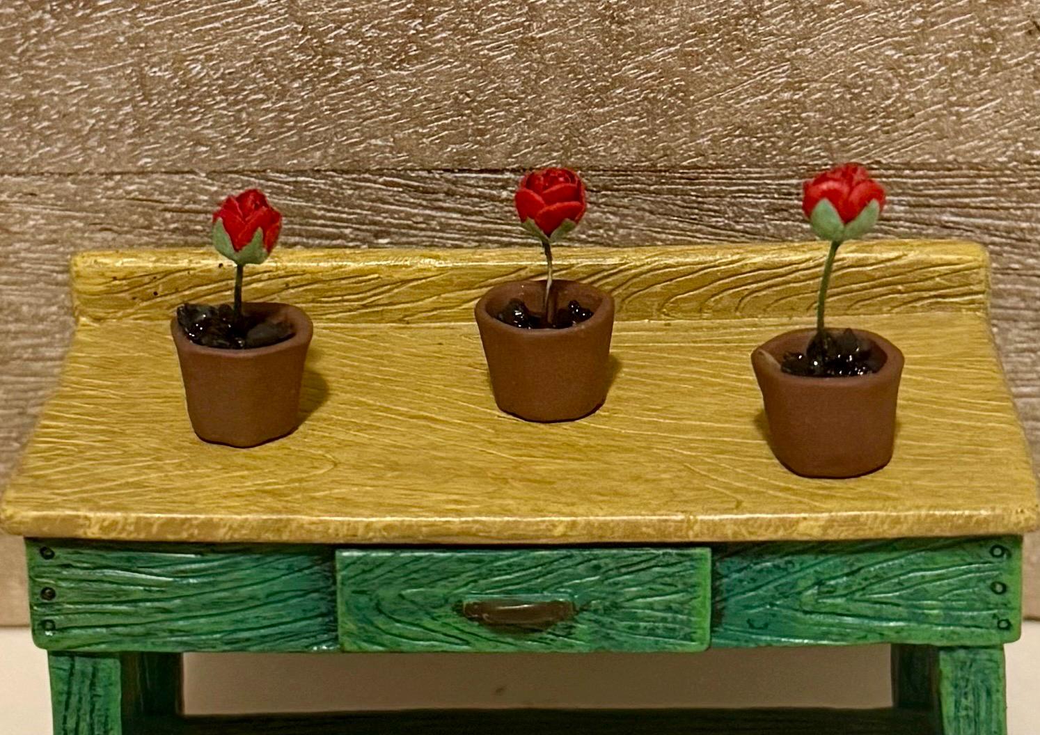 Miniature rose in a terracotta pot-dollhouse scale