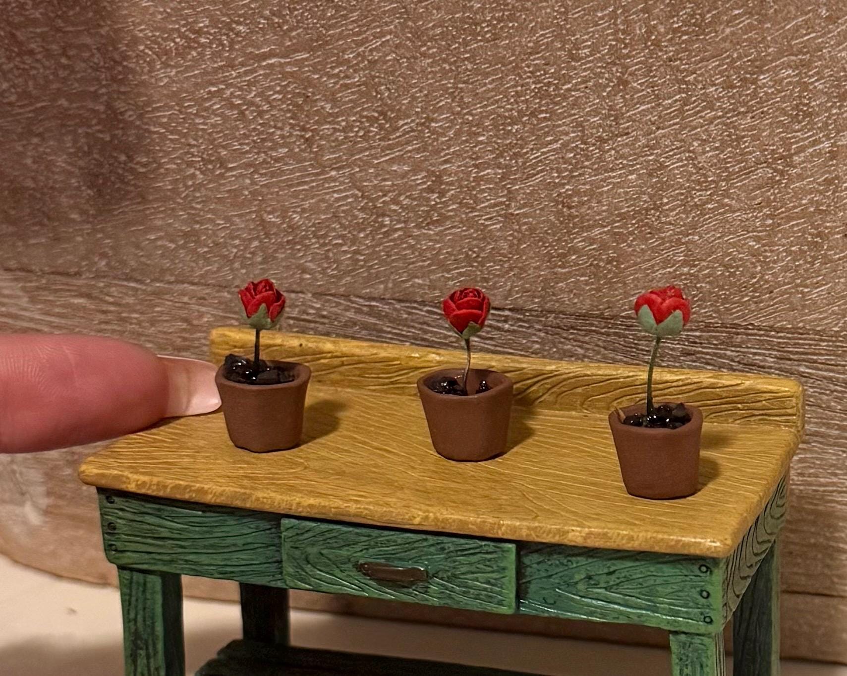 Miniature rose in a terracotta pot-dollhouse scale