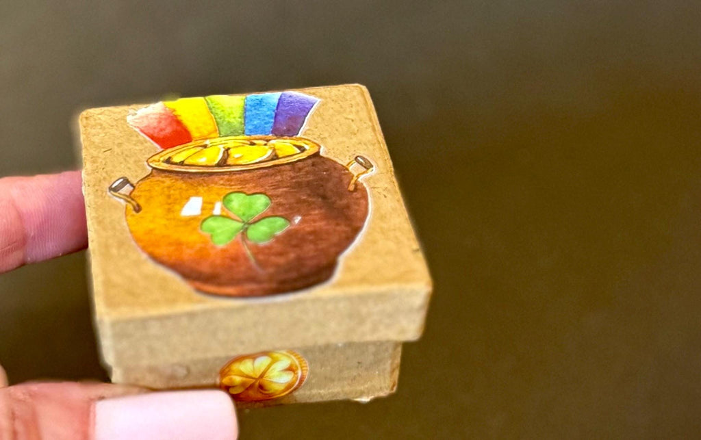 Miniature St. Patrick’s Day paper mache gift boxes with gnome and gold