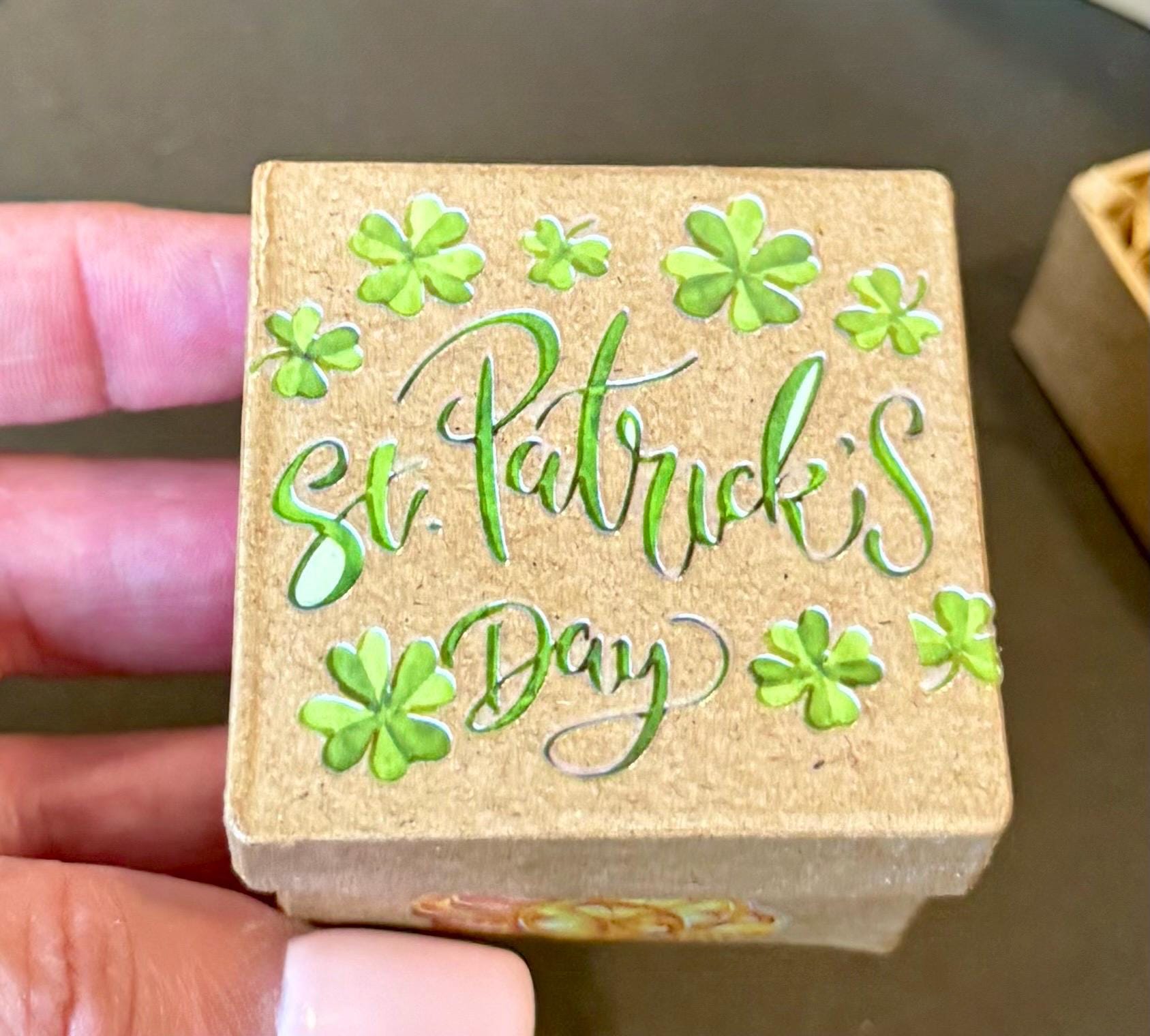 Miniature St. Patrick’s Day paper mache gift boxes with gnome and gold