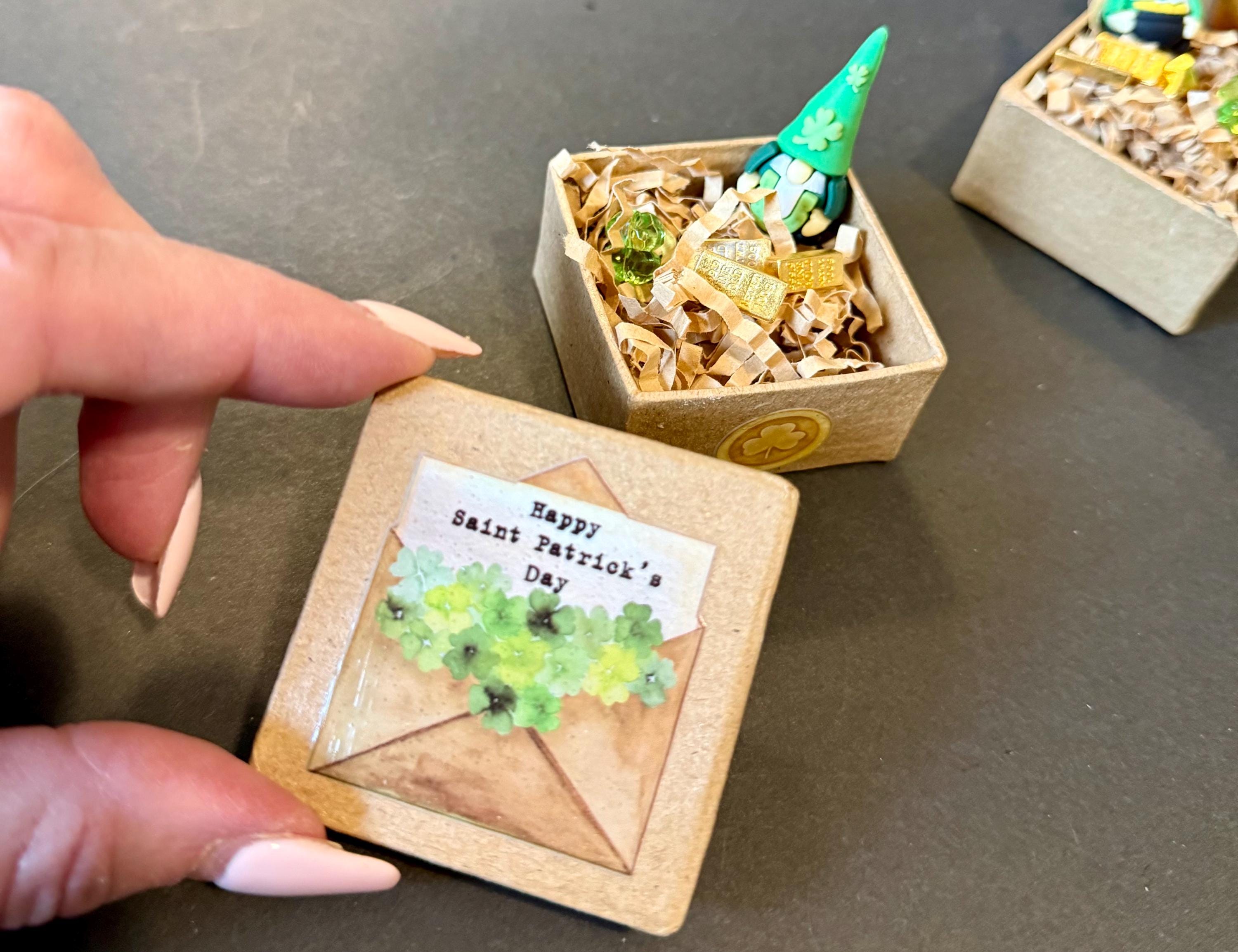 Miniature St. Patrick’s Day paper mache gift boxes with gnome and gold