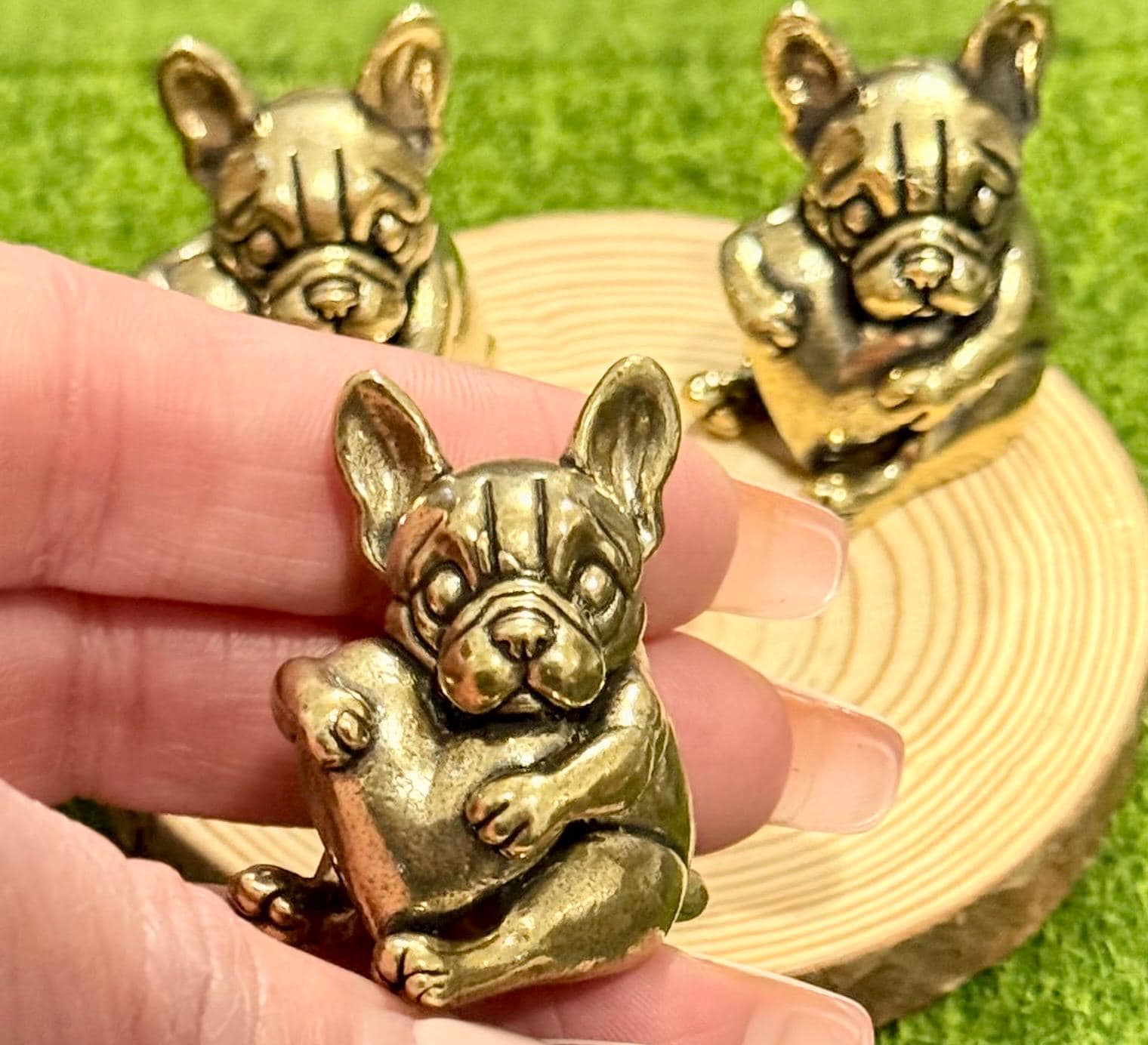 Miniature brass vintage Dog holding a heart figurine
