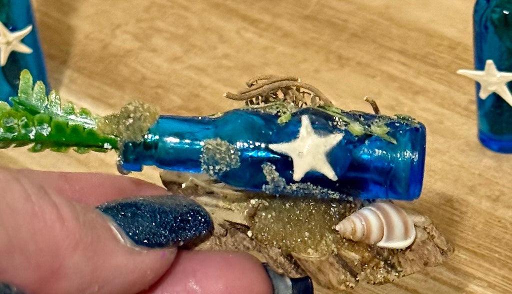 Miniature blue beachy themed glass bottles with plant-3 piece set