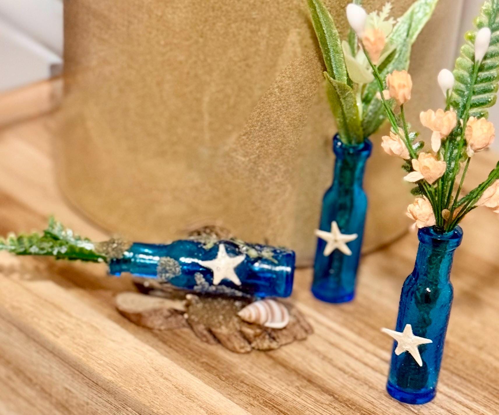 Miniature blue beachy themed glass bottles with plant-3 piece set