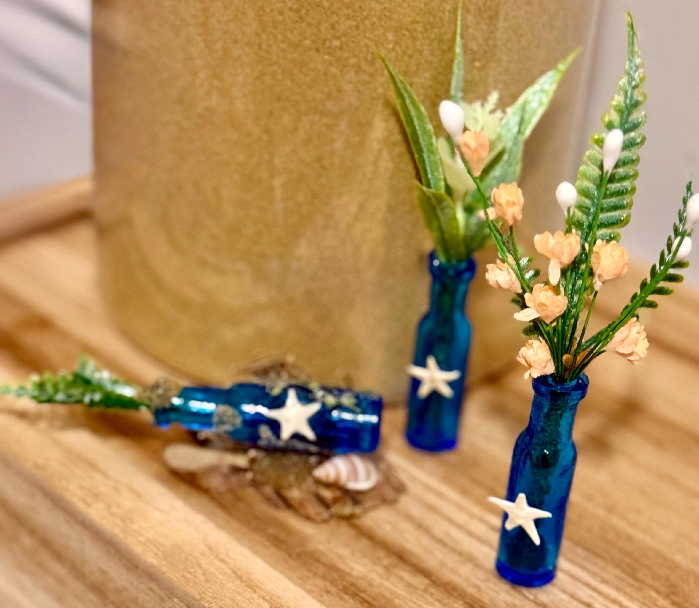 Miniature blue beachy themed glass bottles with plant-3 piece set