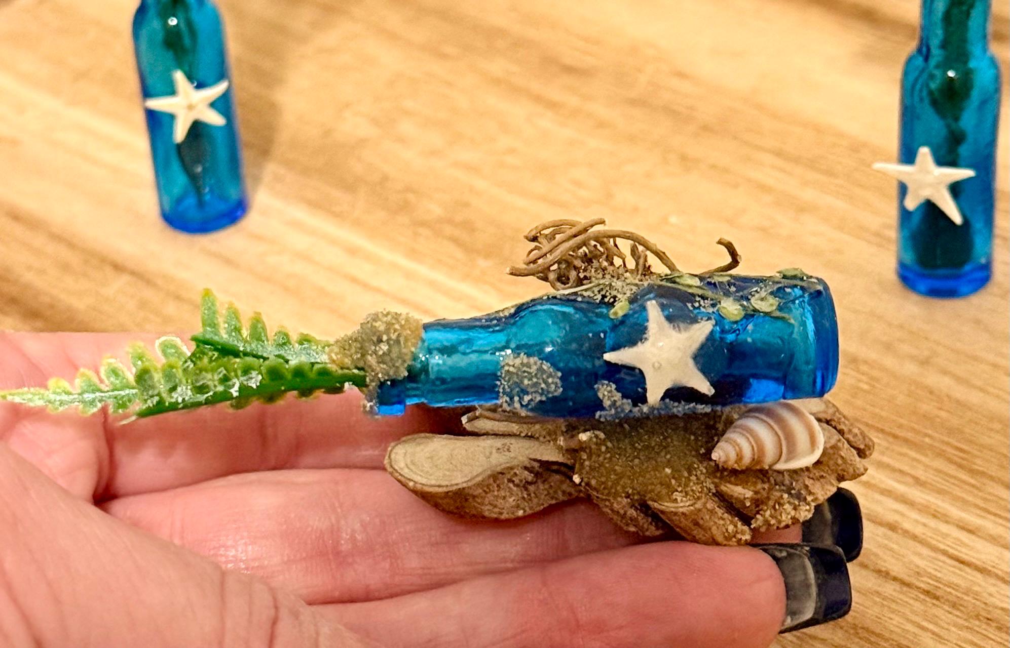 Miniature blue beachy themed glass bottles with plant-3 piece set