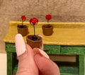 Miniature rose in a terracotta pot-dollhouse scale