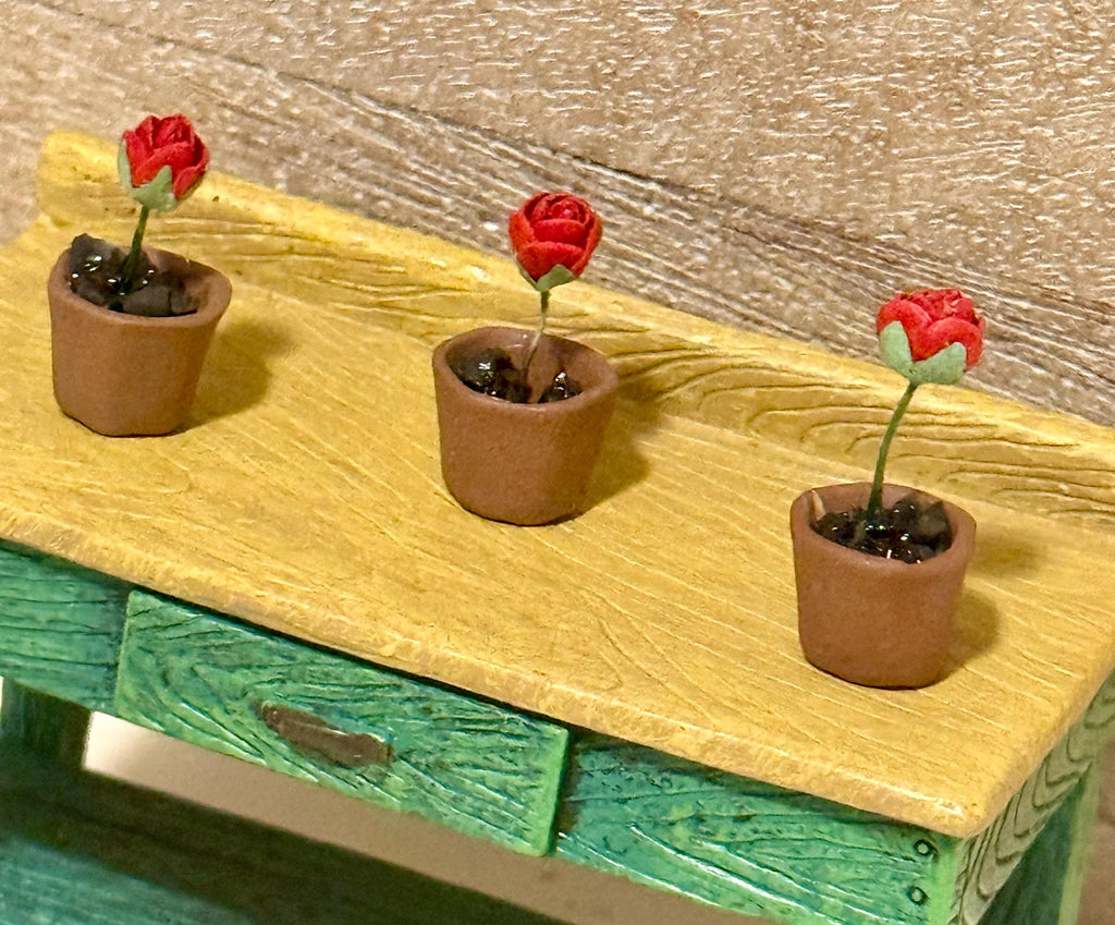 Miniature rose in a terracotta pot-dollhouse scale