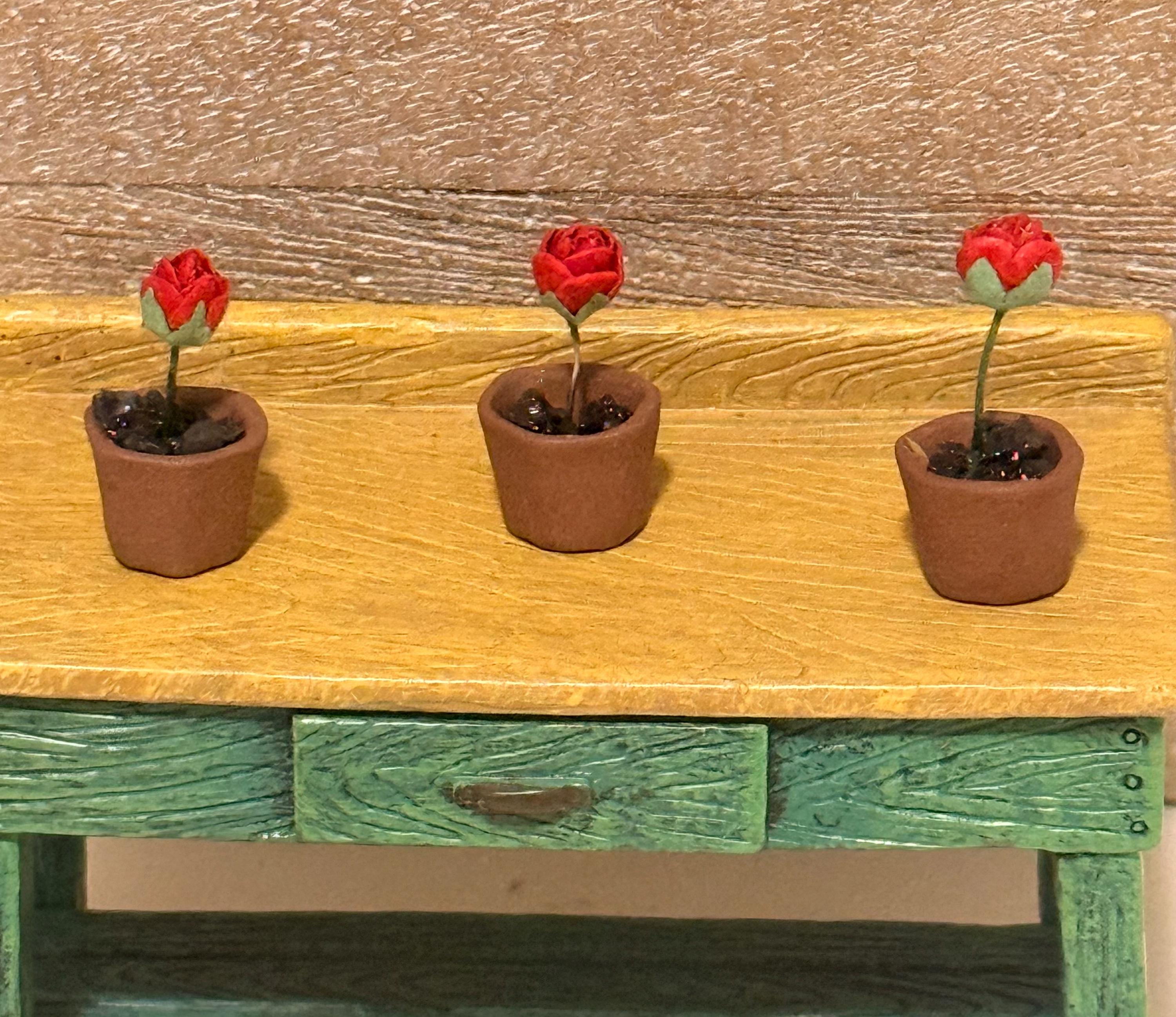 Miniature rose in a terracotta pot-dollhouse scale
