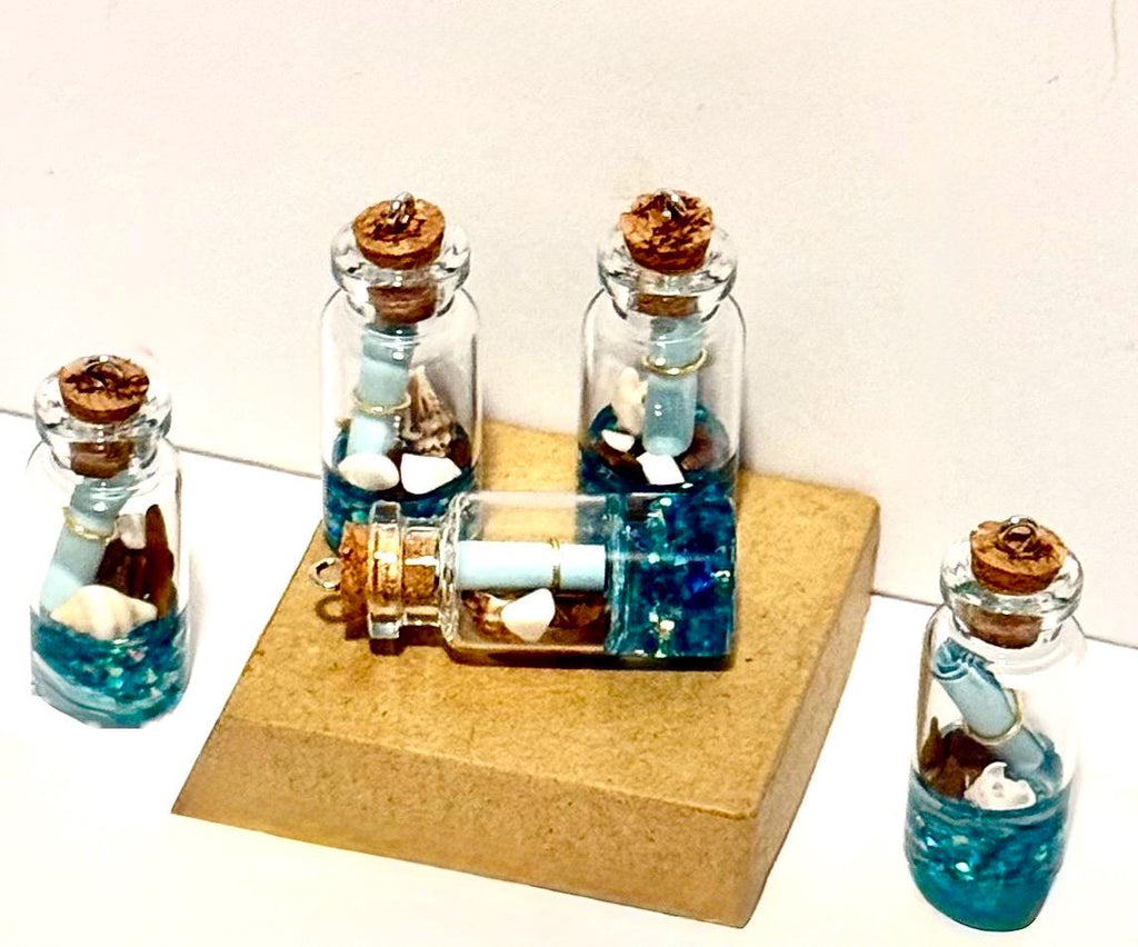 Miniature ocean theme message in a bottle
