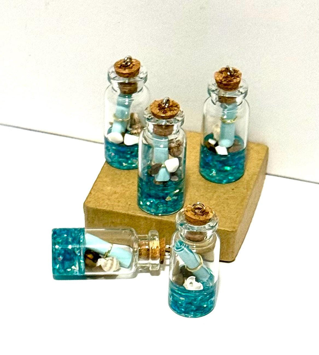 Miniature ocean theme message in a bottle