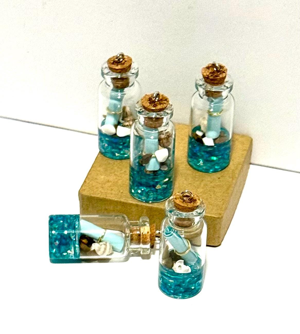 Miniature ocean theme message in a bottle