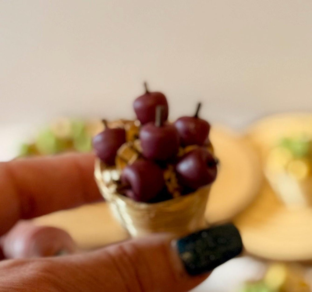 Miniature apples in a basket