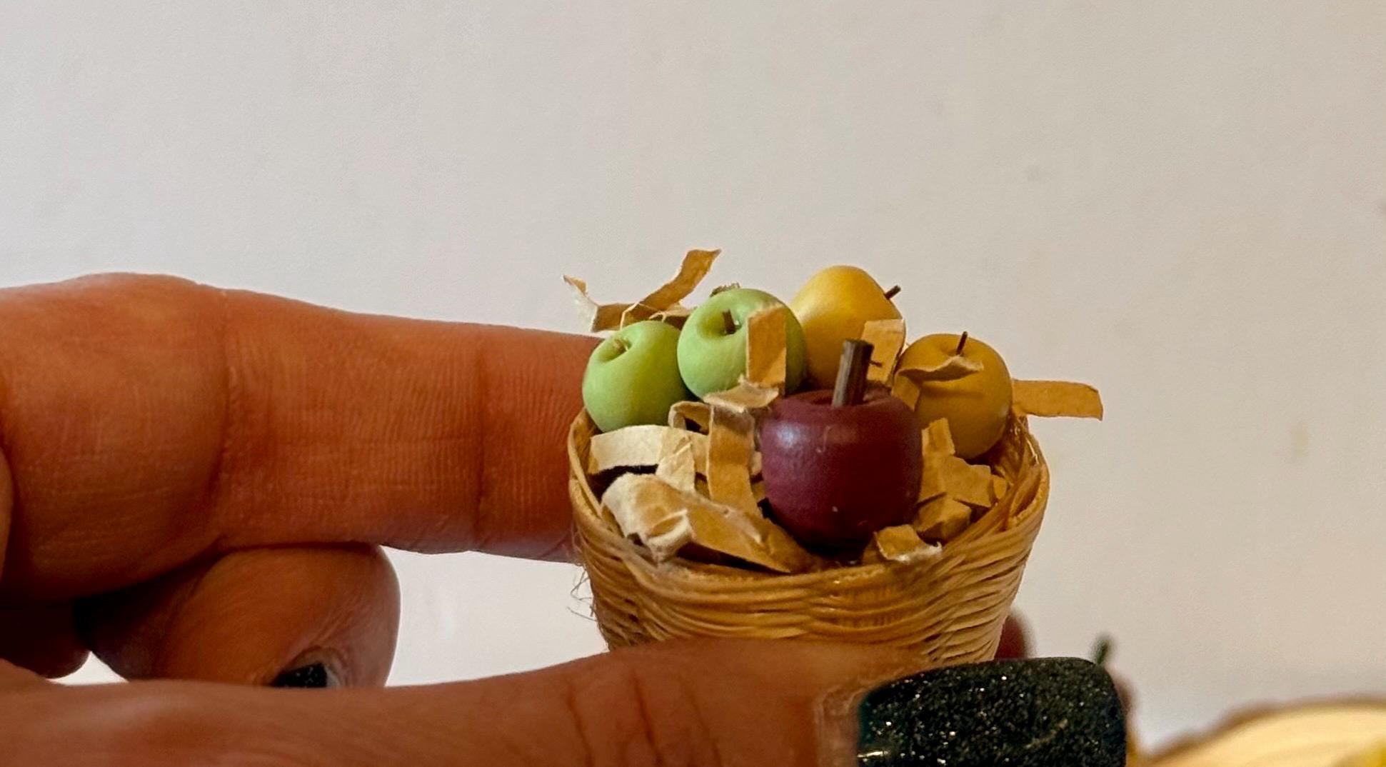 Miniature apples in a basket