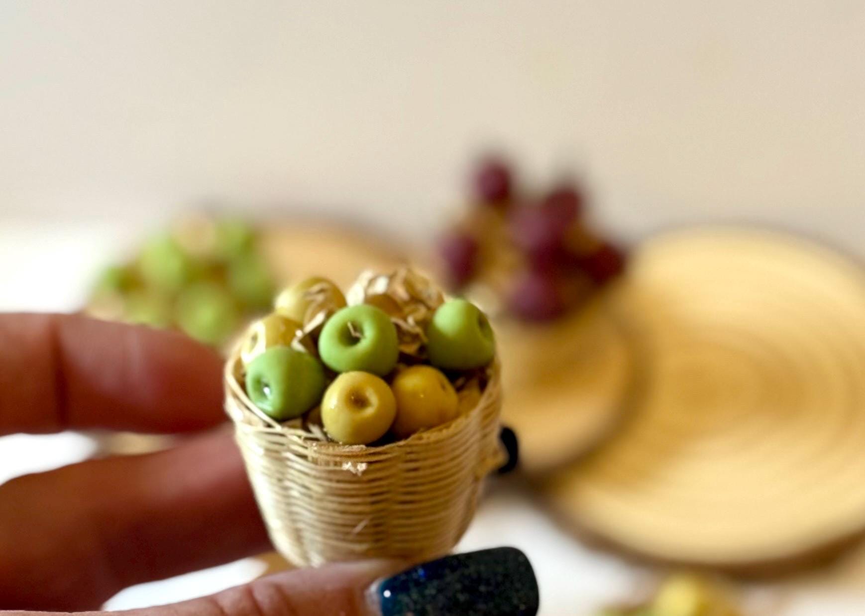 Miniature apples in a basket
