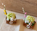Miniature Easter bunny and flowers in wooden crate with heart -includes mini eggs