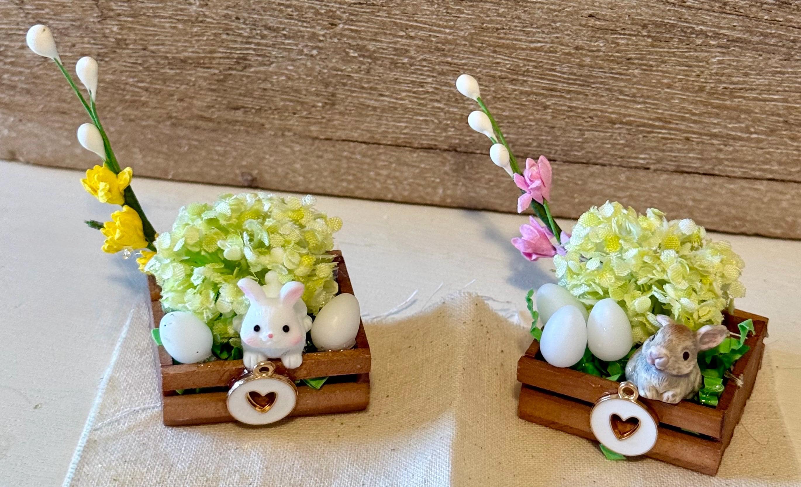 Miniature Easter bunny and flowers in wooden crate with heart -includes mini eggs
