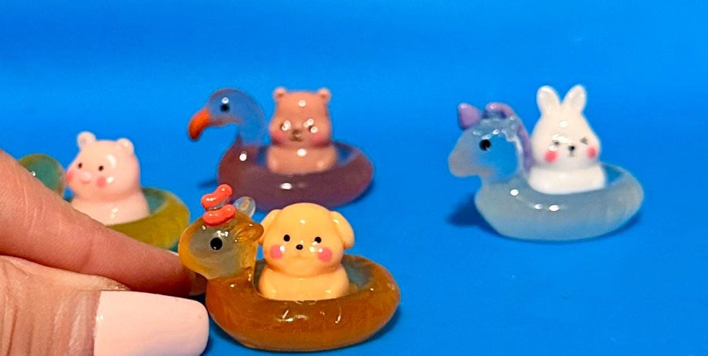 Miniature animals with illuminating duck/animal pool Floaties- figurines
